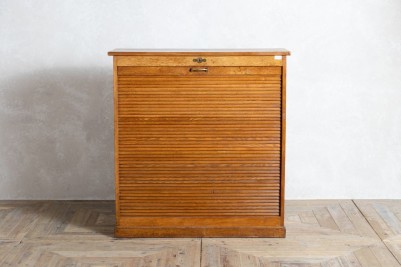 vintage wooden tambour cupboard closed